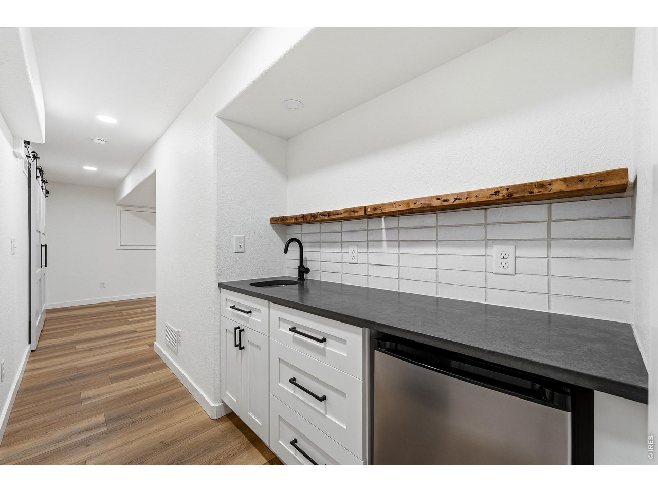 2802 Pleasant Valley Road Fort Collins, CO 80521 - Photo 12 of 17 a kitchen with a sink and cabinets