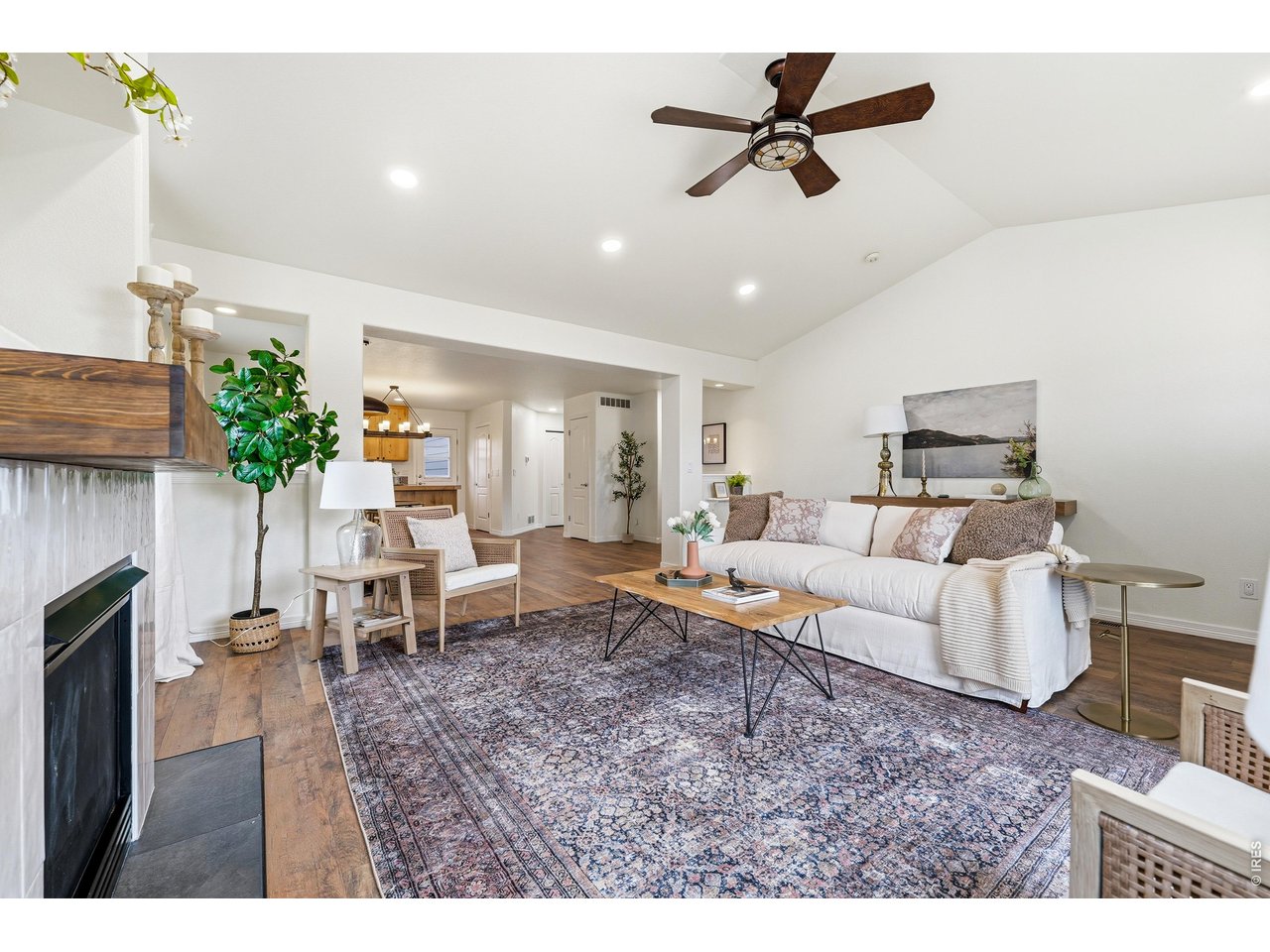 2802 Pleasant Valley Road Fort Collins, CO 80521 - Photo 4 of 17 a living room with furniture and a fireplace