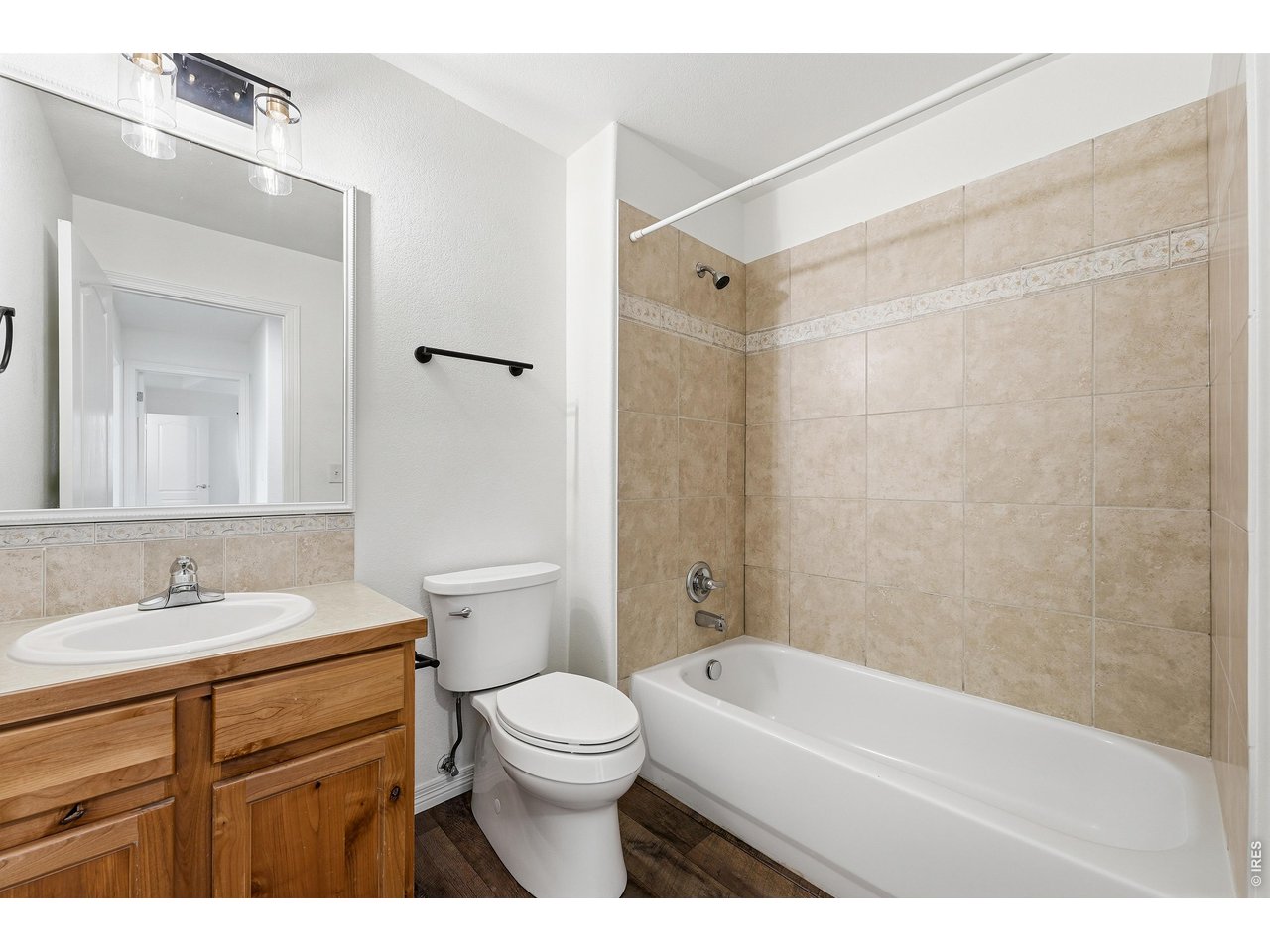 2802 Pleasant Valley Road Fort Collins, CO 80521 - Photo 10 of 17 a bathroom with a sink a toilet and shower