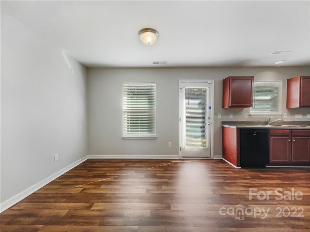 2108 Gunnars Ridge Road Lancaster, SC 29720 - Photo 7 of 18 a view of kitchen with wooden floor and window