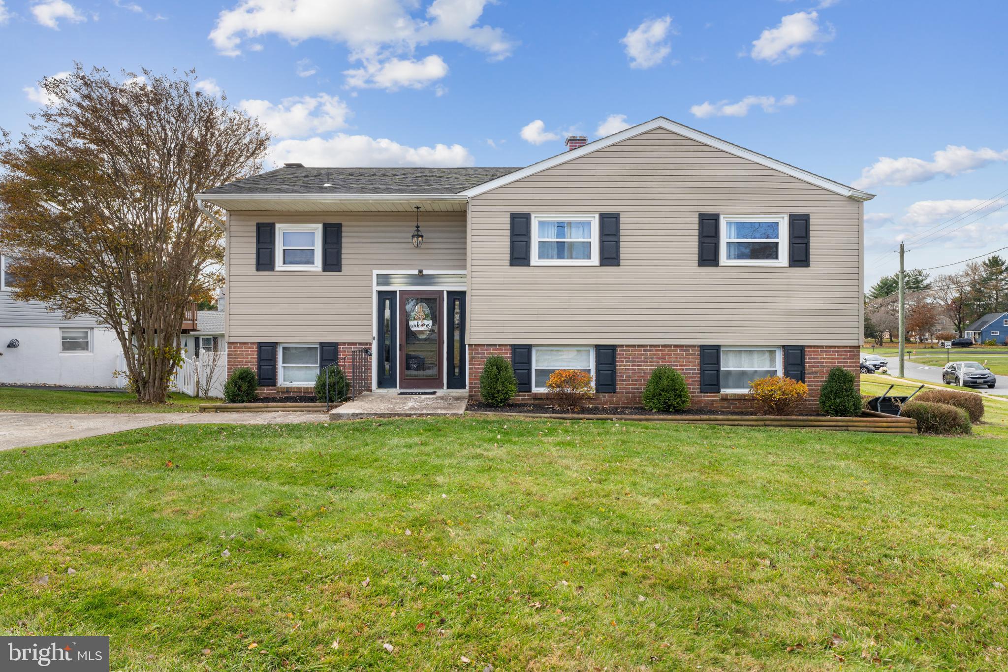 4501 Sandra Lake Road Perry Hall, MD 21128 - Photo 1 of 38 Charming split-level home with lush greenery.