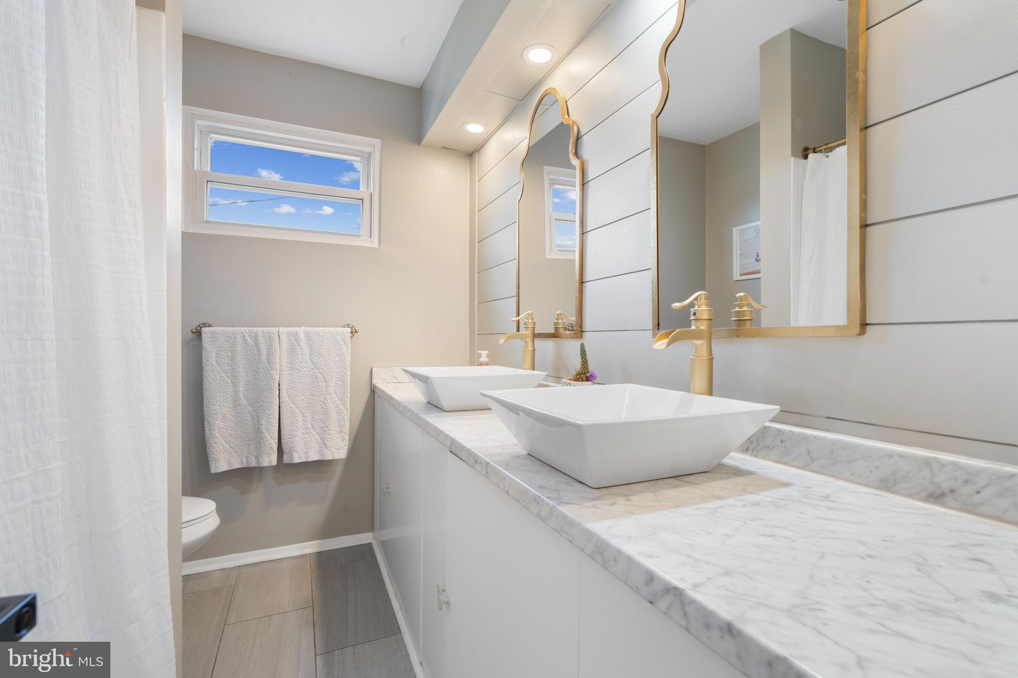4501 Sandra Lake Road Perry Hall, MD 21128 - Photo 16 of 38 Elegant bathroom with modern finishes.
