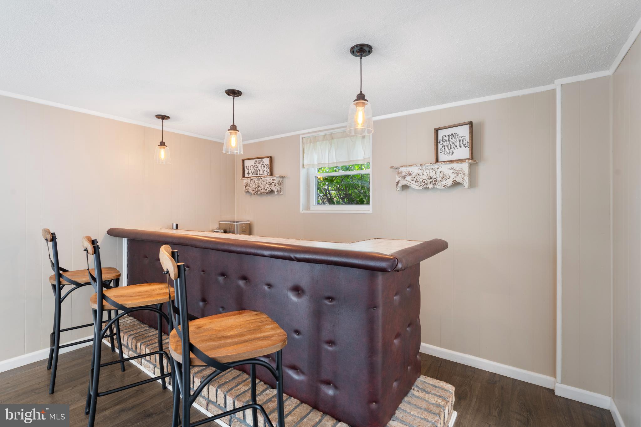 4501 Sandra Lake Road Perry Hall, MD 21128 - Photo 26 of 38 Charming bar area with inviting ambiance.