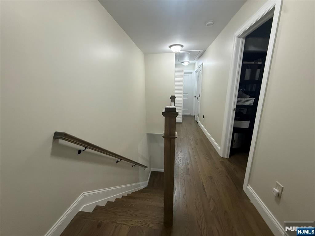 43 Jackson Avenue, Unit 1 Hackensack, NJ 07601 - Photo 8 of 14 a view of a hallway with wooden floor
