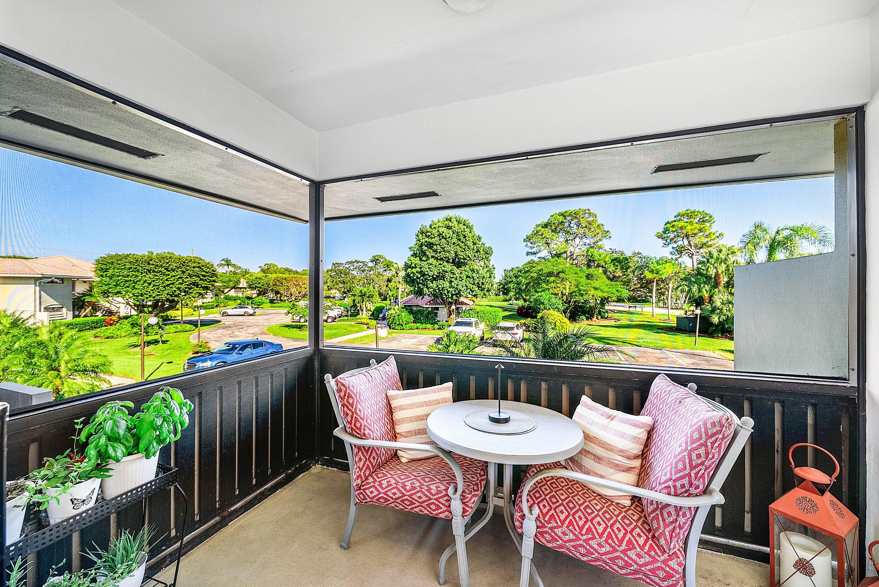 11126 Quail Covey Road, Unit MOCKINGBIRD Boynton Beach, FL 33436 - Photo 12 of 58 a outdoor view with a seating space