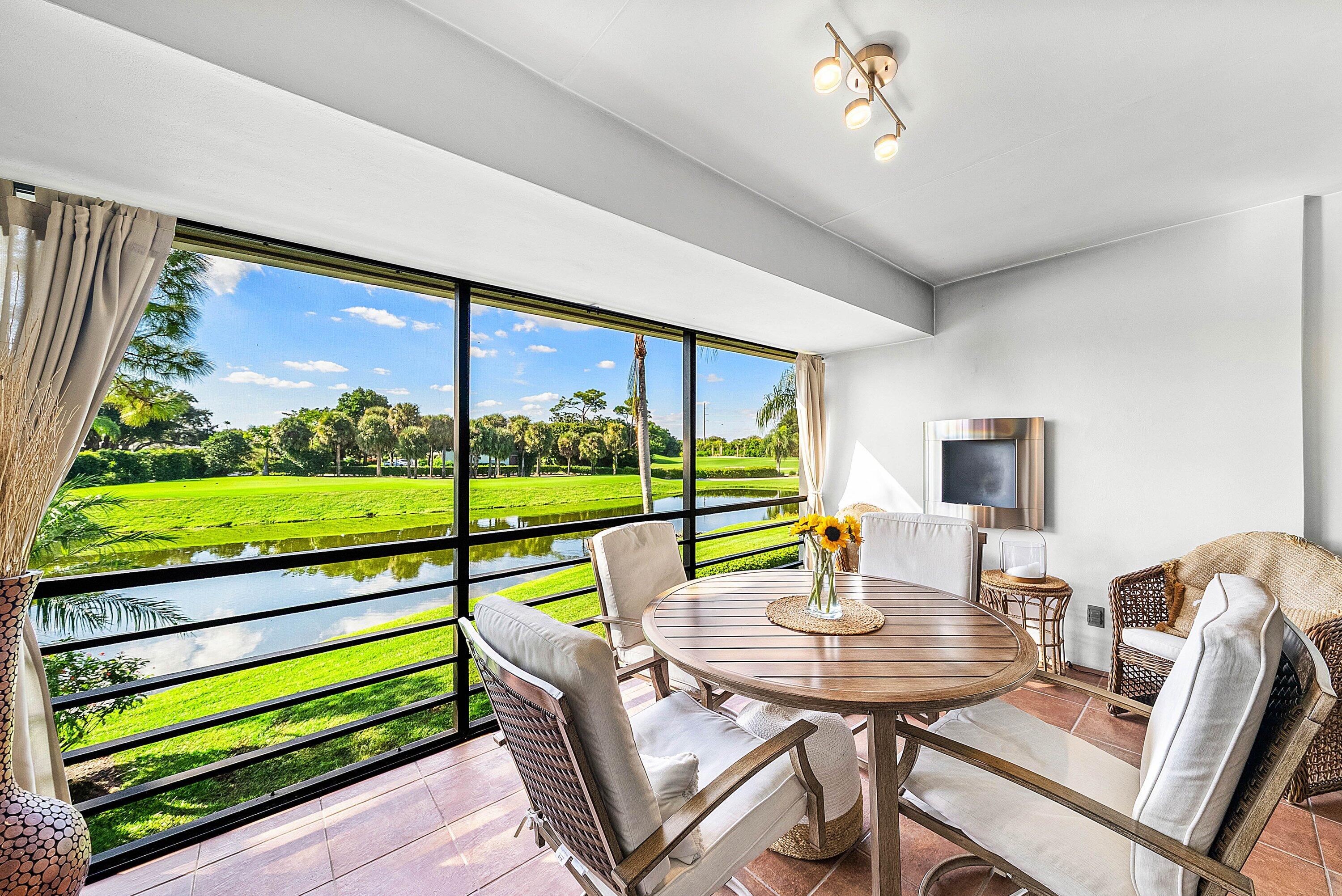 11126 Quail Covey Road, Unit MOCKINGBIRD Boynton Beach, FL 33436 - Photo 20 of 58 Screened Terrace