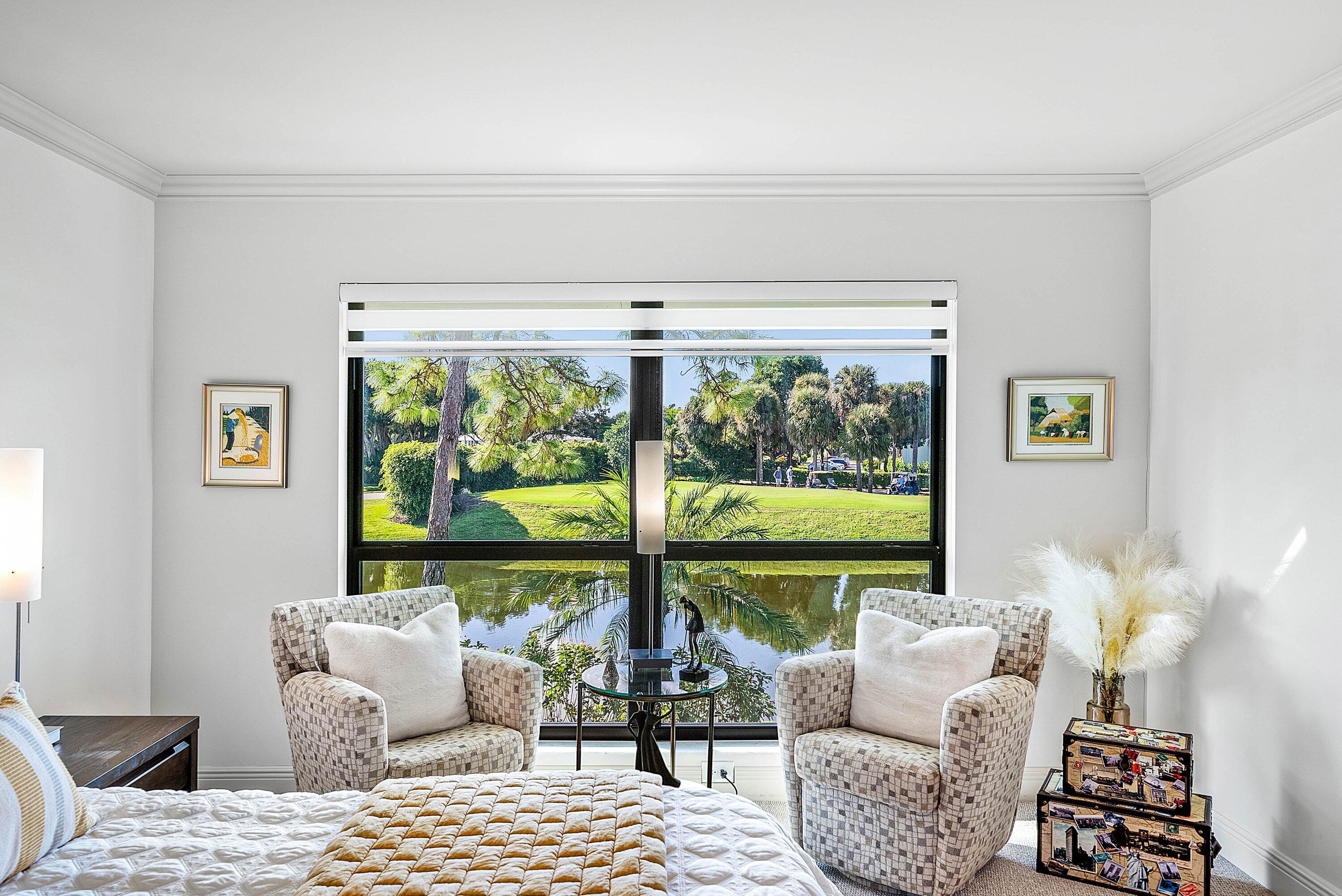 11126 Quail Covey Road, Unit MOCKINGBIRD Boynton Beach, FL 33436 - Photo 23 of 58 a living room with furniture and a large window