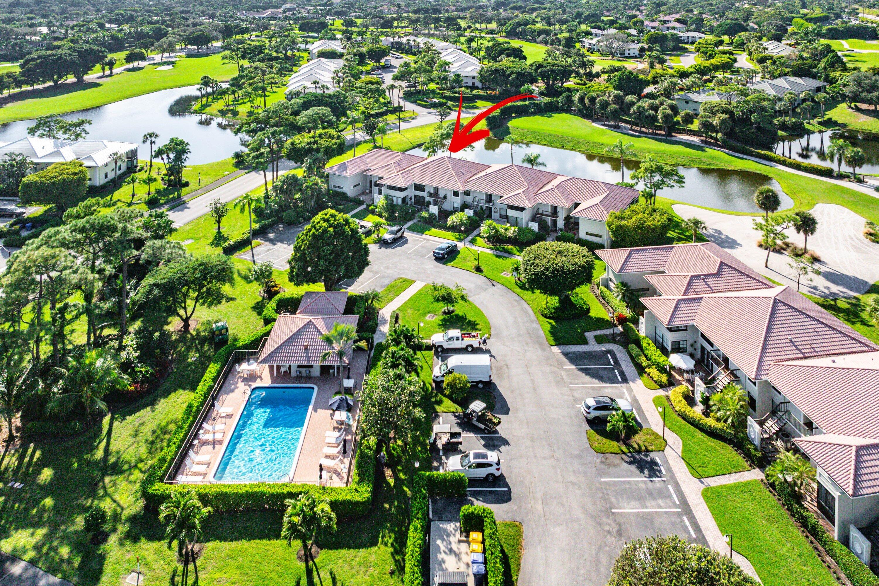 11126 Quail Covey Road, Unit MOCKINGBIRD Boynton Beach, FL 33436 - Photo 41 of 58 an aerial view of residential houses with outdoor space and swimming pool
