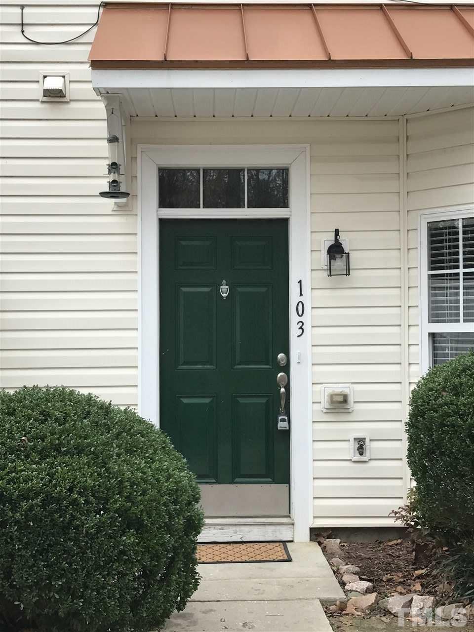 11720 Mezzanine Drive, Unit 103 Raleigh, NC 27614 - Photo 2 of 21 a view of a entryway door of the house