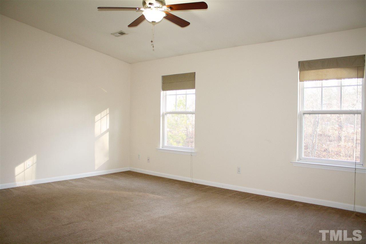 11720 Mezzanine Drive, Unit 103 Raleigh, NC 27614 - Photo 11 of 21 a view of an empty room with a window