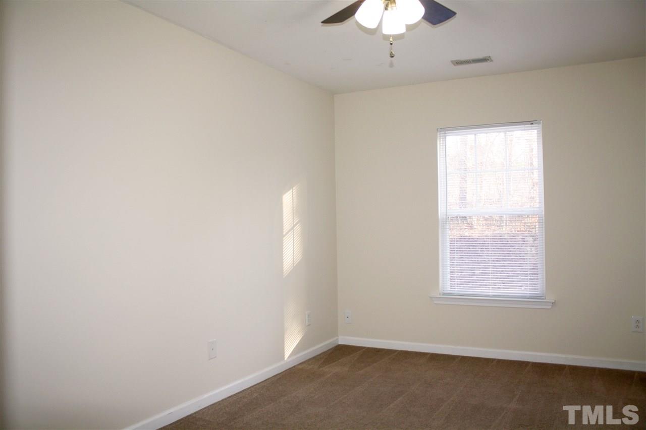 11720 Mezzanine Drive, Unit 103 Raleigh, NC 27614 - Photo 16 of 21 an empty room with a window
