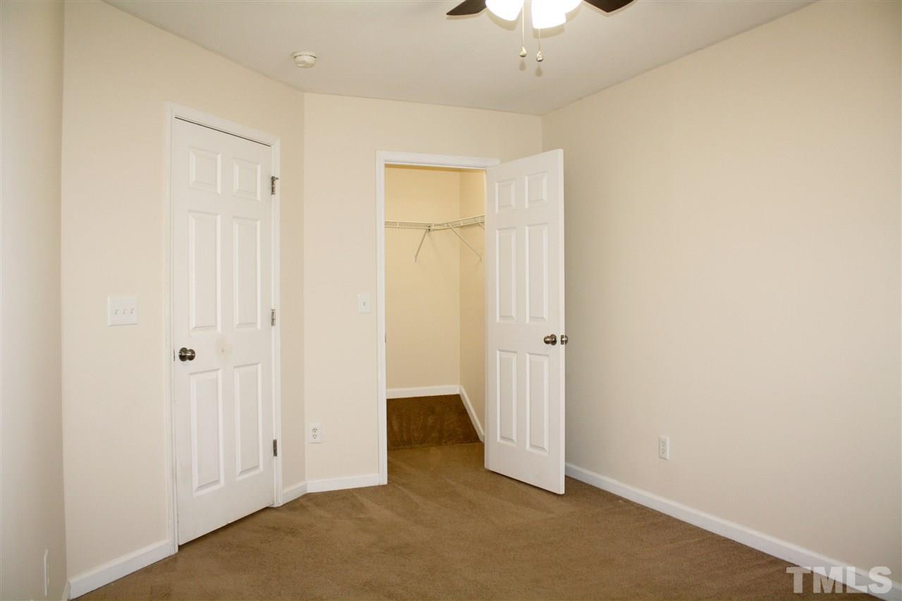11720 Mezzanine Drive, Unit 103 Raleigh, NC 27614 - Photo 17 of 21 an empty room with a door