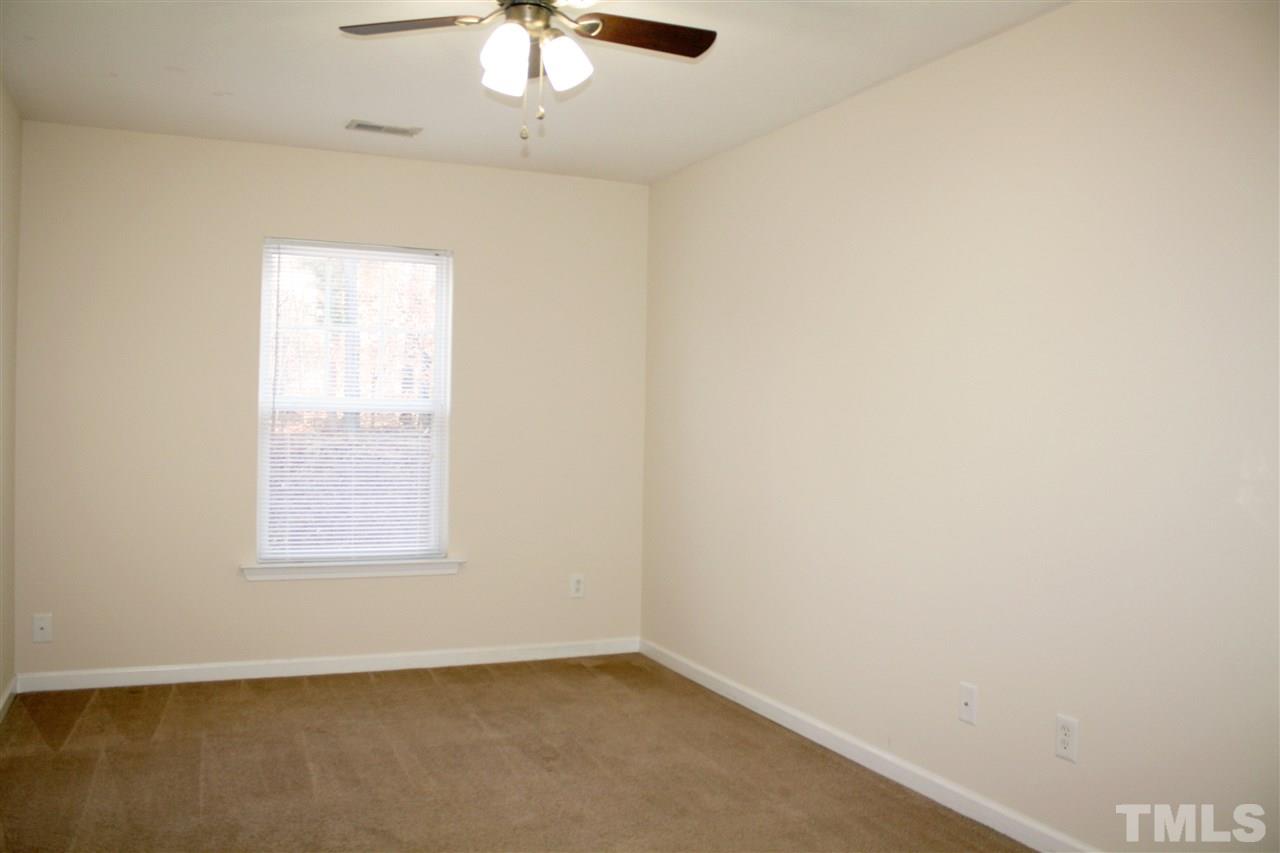 11720 Mezzanine Drive, Unit 103 Raleigh, NC 27614 - Photo 18 of 21 an empty room with a window