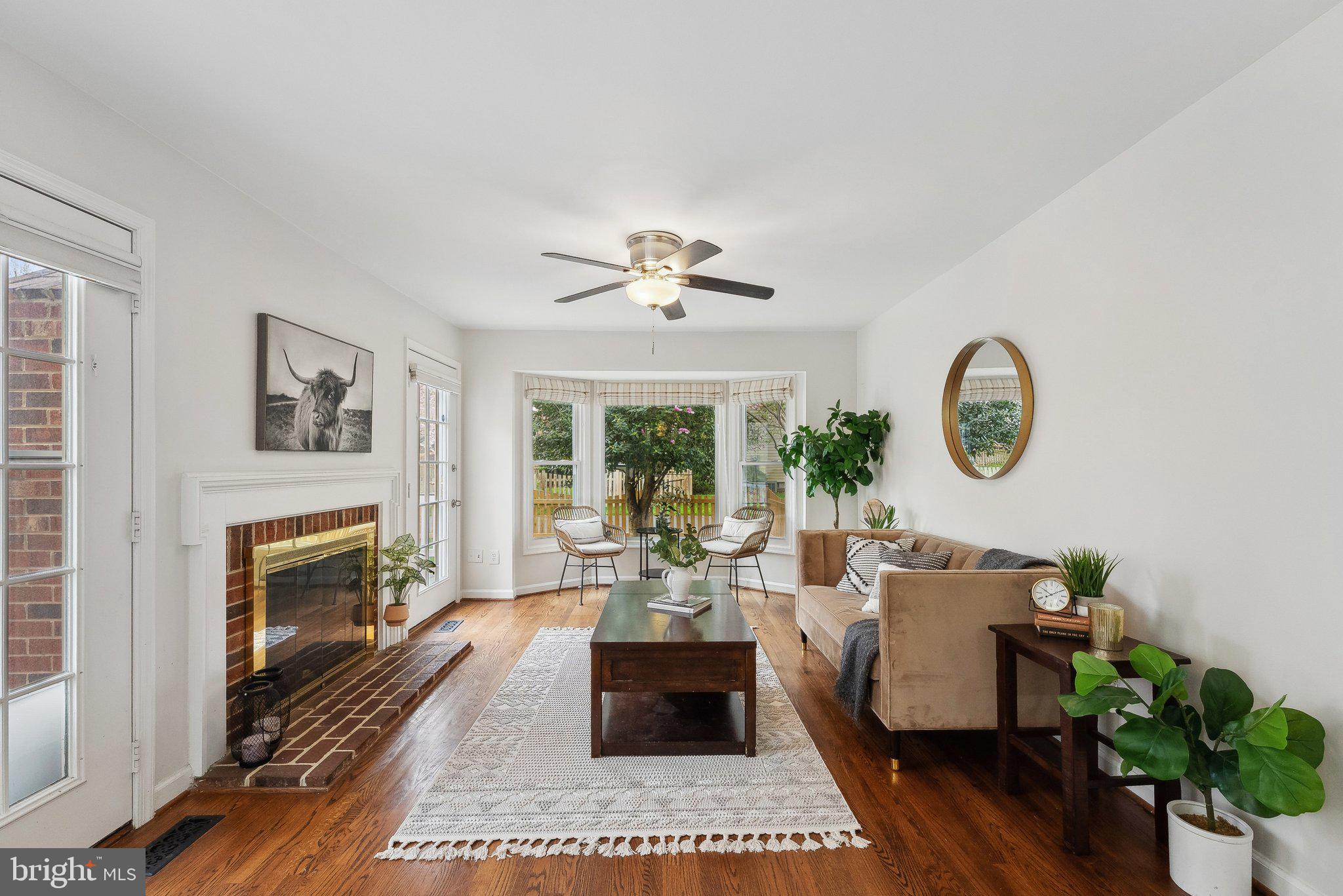 7940 Donegal Lane Springfield, VA 22153 - Photo 13 of 36 a living room with furniture fireplace and window