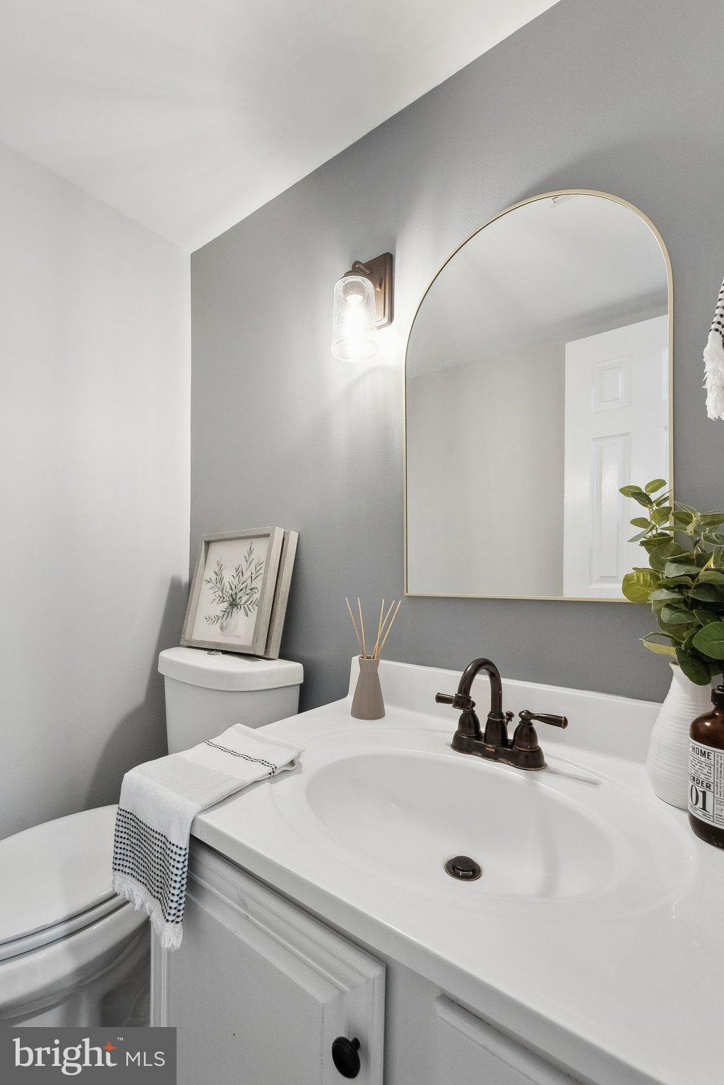 7940 Donegal Lane Springfield, VA 22153 - Photo 14 of 36 a bathroom with a sink and a mirror
