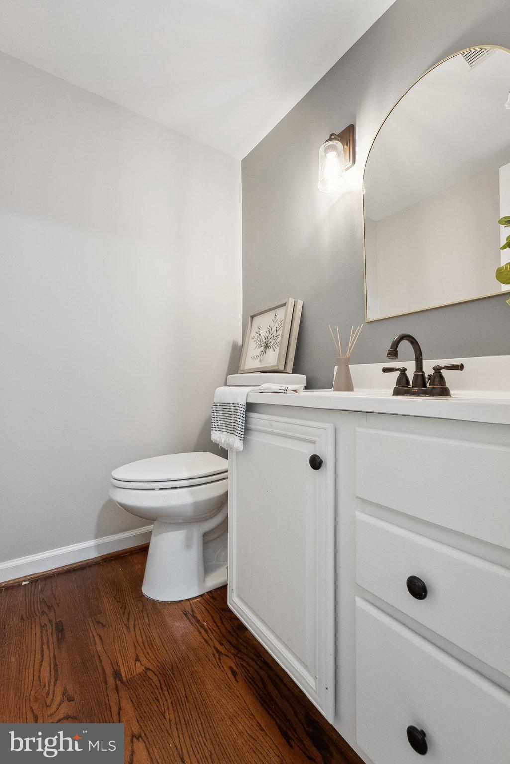 7940 Donegal Lane Springfield, VA 22153 - Photo 15 of 36 a bathroom with a toilet sink and mirror