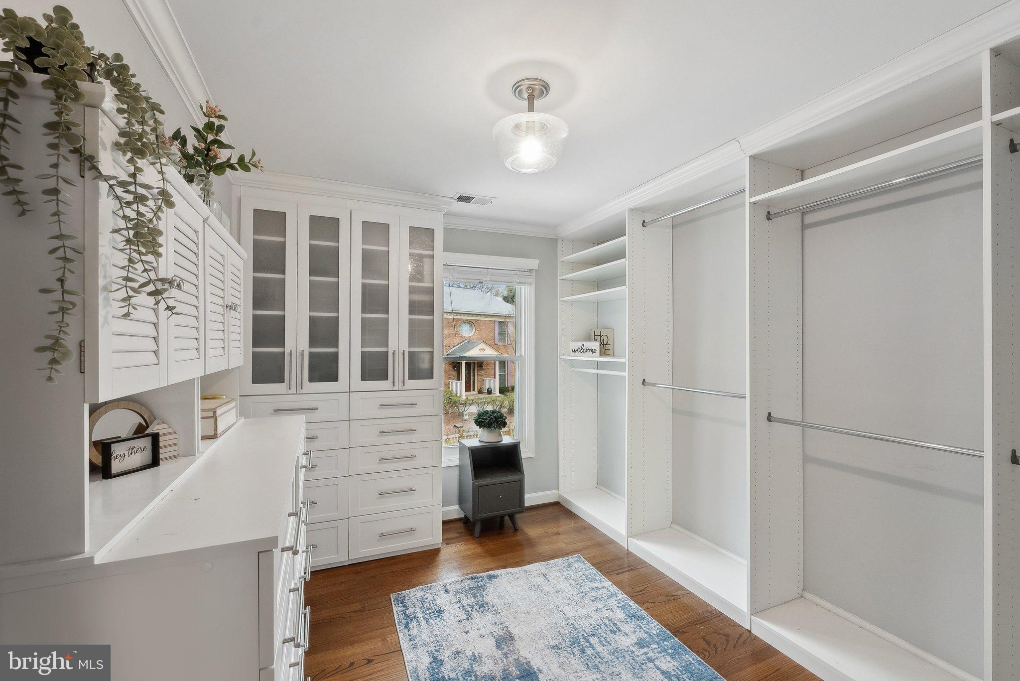 7940 Donegal Lane Springfield, VA 22153 - Photo 20 of 36 walk in closet with white walls and cabinets