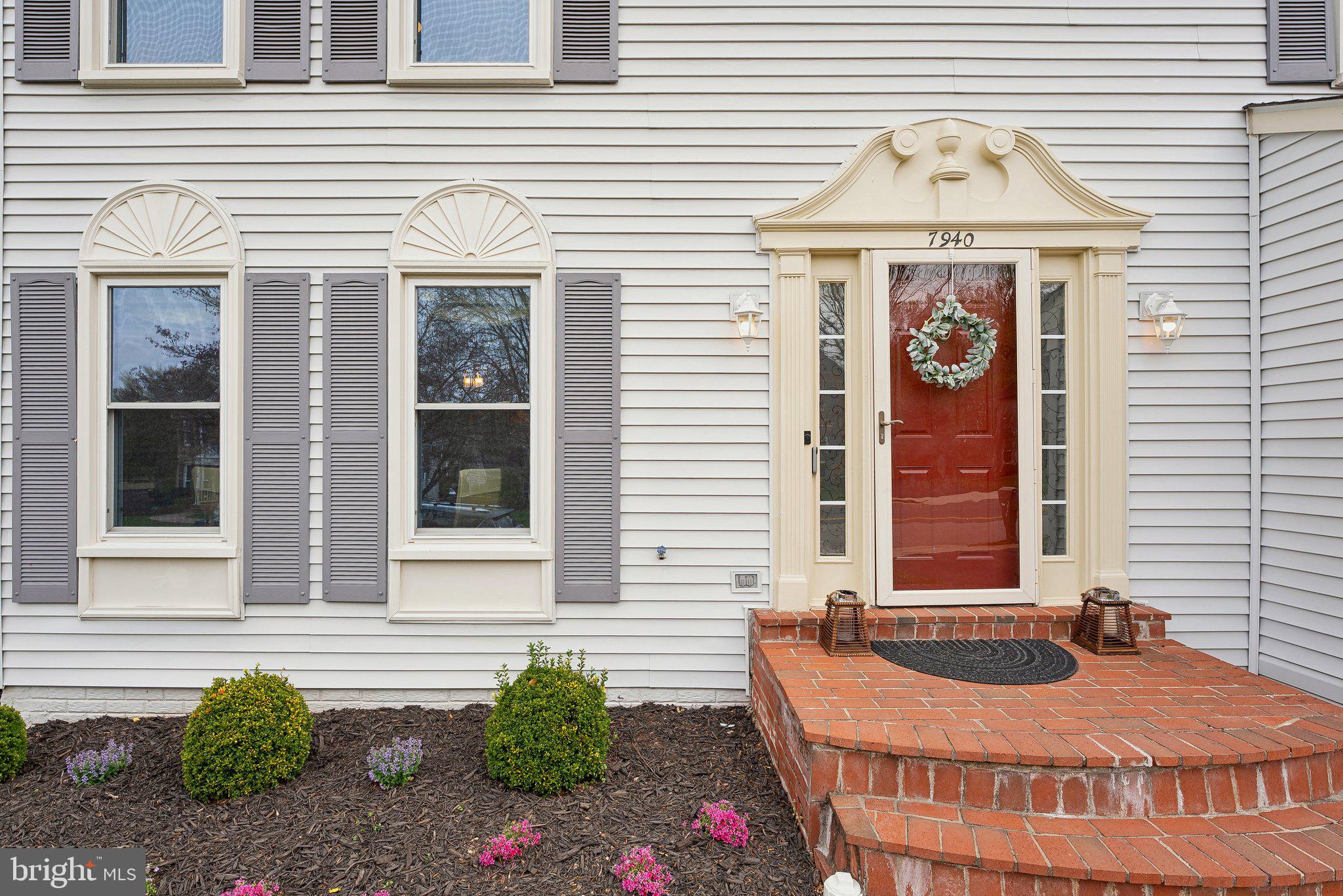 7940 Donegal Lane Springfield, VA 22153 - Photo 2 of 36 a front view of a house with garden