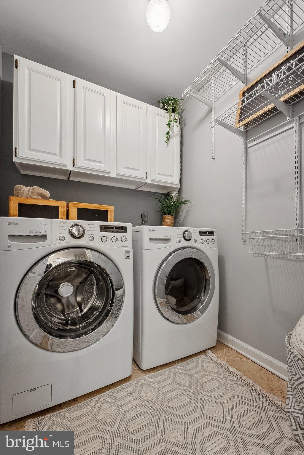 7940 Donegal Lane Springfield, VA 22153 - Photo 28 of 36 a utility room with sink dryer and washer