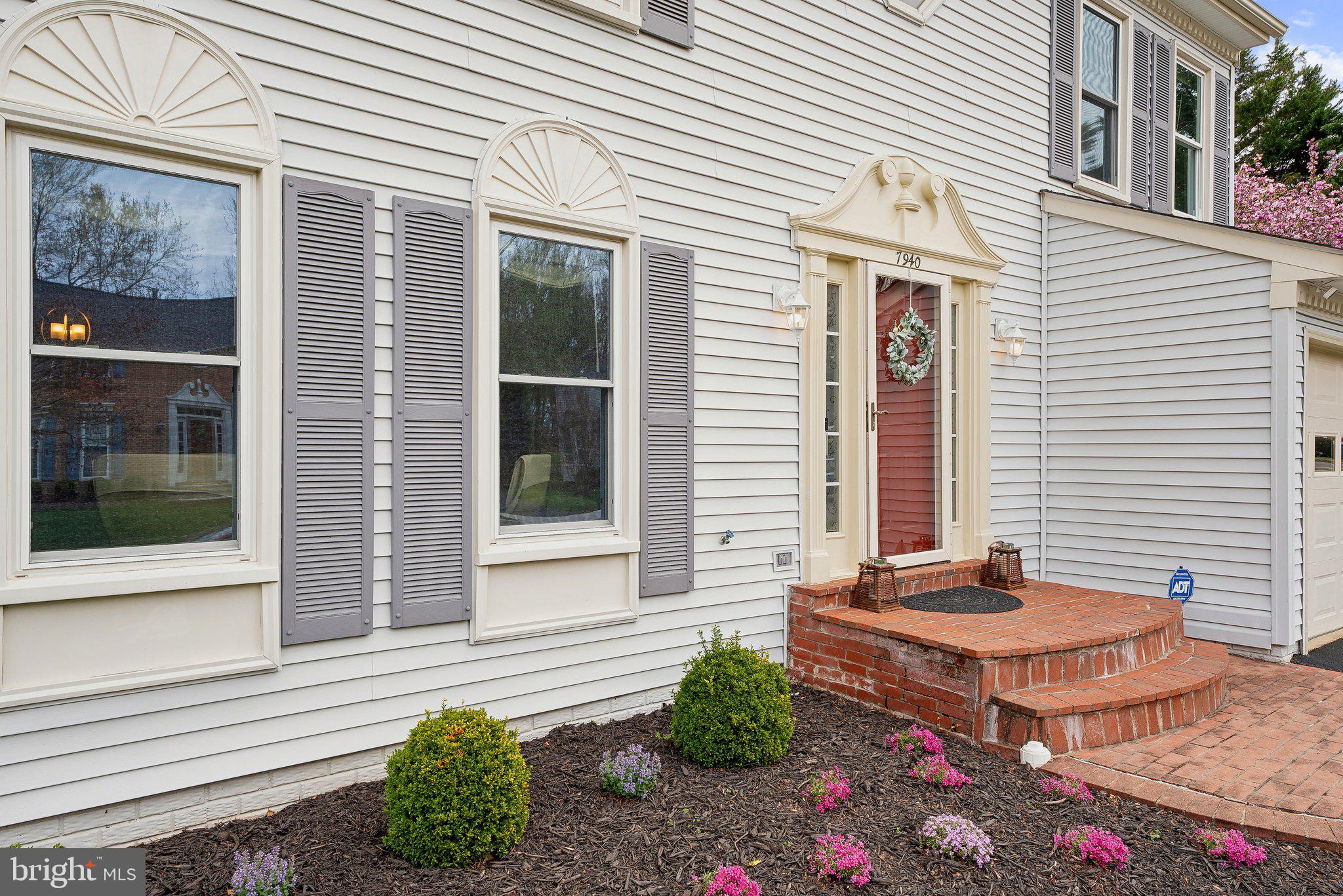 7940 Donegal Lane Springfield, VA 22153 - Photo 3 of 36 a backyard of a house with outdoor seating