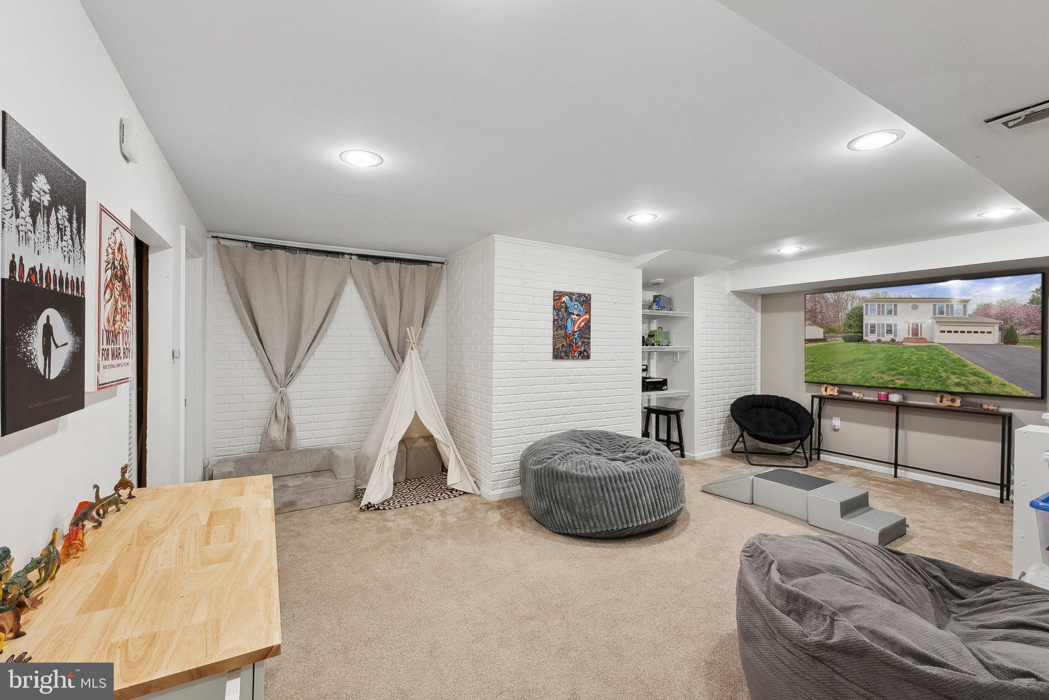 7940 Donegal Lane Springfield, VA 22153 - Photo 31 of 36 a bedroom with furniture and a flat screen tv