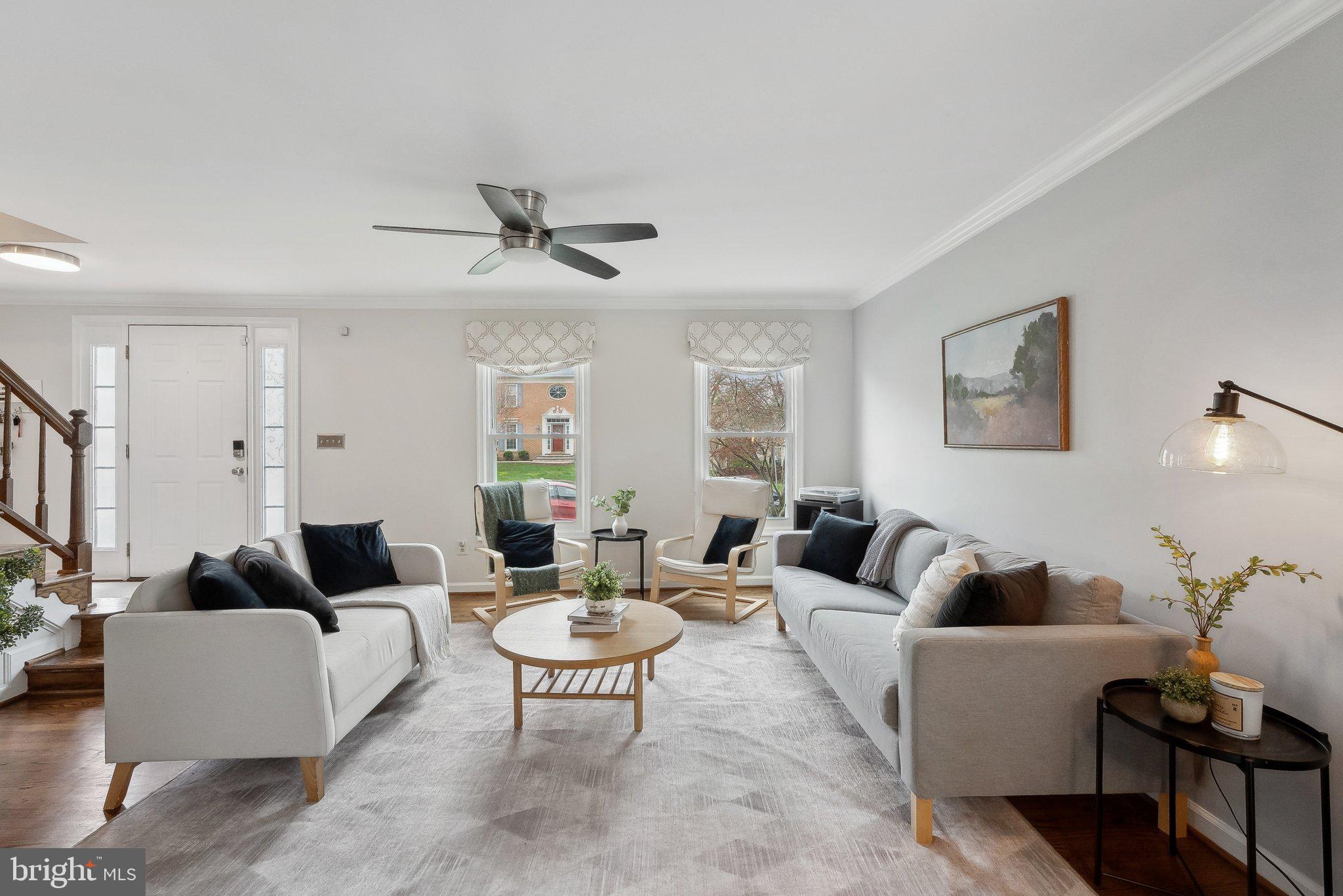 7940 Donegal Lane Springfield, VA 22153 - Photo 6 of 36 a living room with furniture and a ceiling fan