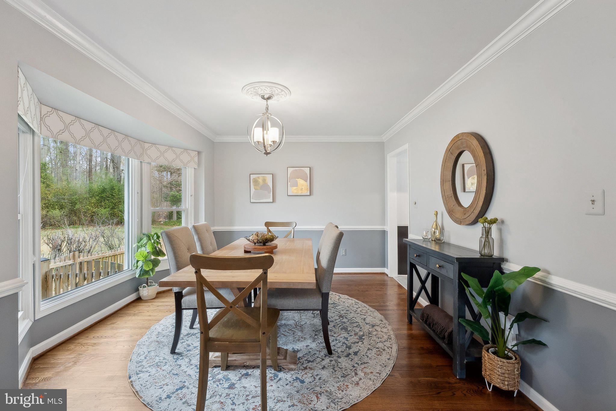 7940 Donegal Lane Springfield, VA 22153 - Photo 8 of 36 a dining room with furniture and a large window