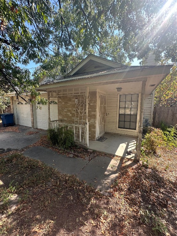 12313 Emery Oaks Road Austin, TX 78758 - Photo 1 of 1 a front view of a house with garden