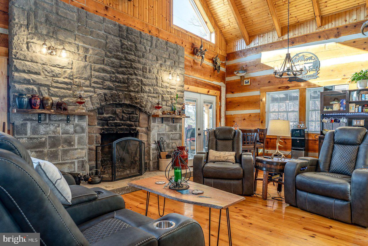 147 Bear Rdg Lane Milam, WV 26838 - Photo 17 of 72 a outdoor living space with patio furniture and a fireplace