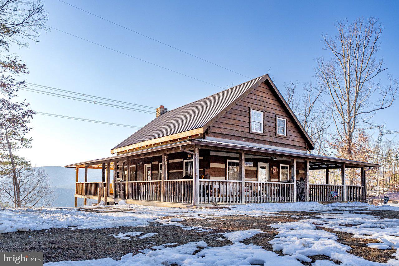 147 Bear Rdg Lane Milam, WV 26838 - Photo 2 of 72 a front view of a house