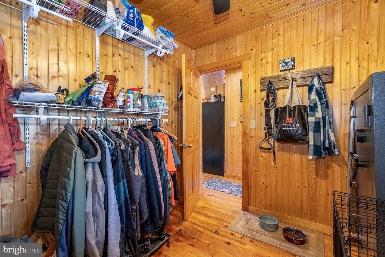 147 Bear Rdg Lane Milam, WV 26838 - Photo 28 of 72 a view of walk in closet with clothes and shoes