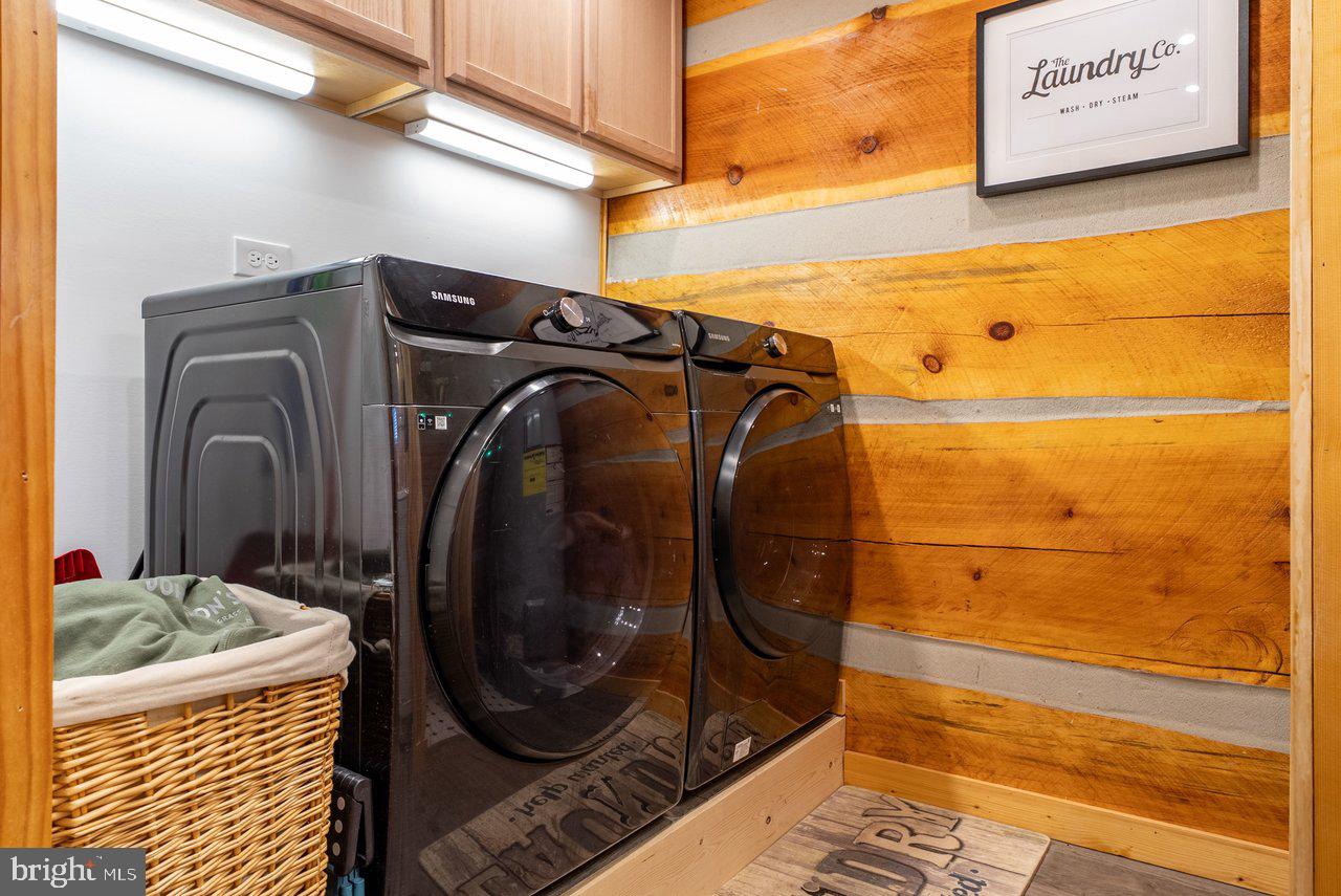 147 Bear Rdg Lane Milam, WV 26838 - Photo 32 of 72 a utility room with dryer and washer