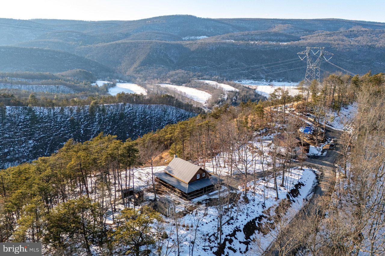 147 Bear Rdg Lane Milam, WV 26838 - Photo 49 of 72 a view of a backyard with wooden fence