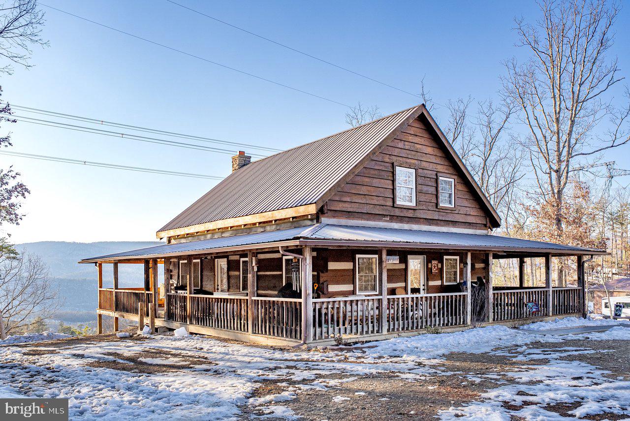 147 Bear Rdg Lane Milam, WV 26838 - Photo 58 of 72 a front view of a house with a deck