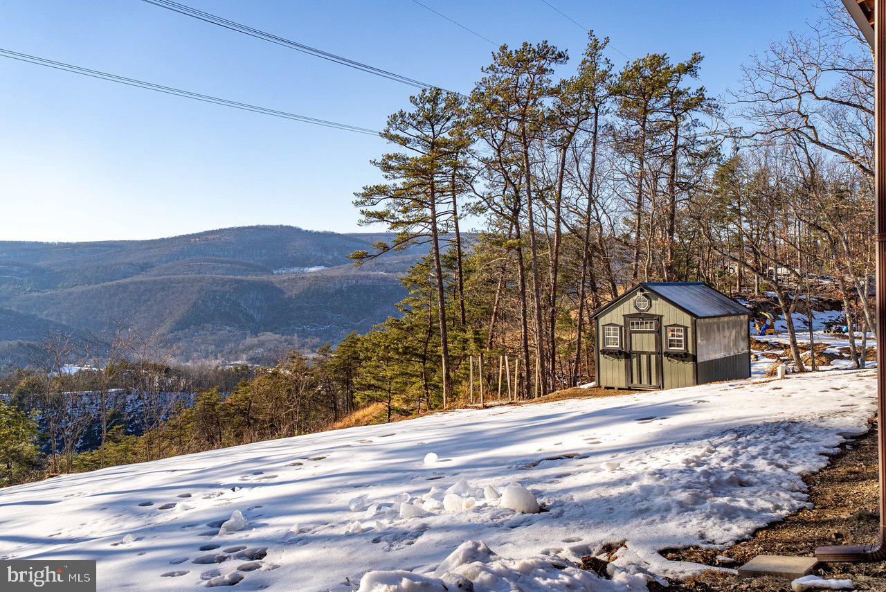 147 Bear Rdg Lane Milam, WV 26838 - Photo 70 of 72 a front view of a house with a yard and mountain view