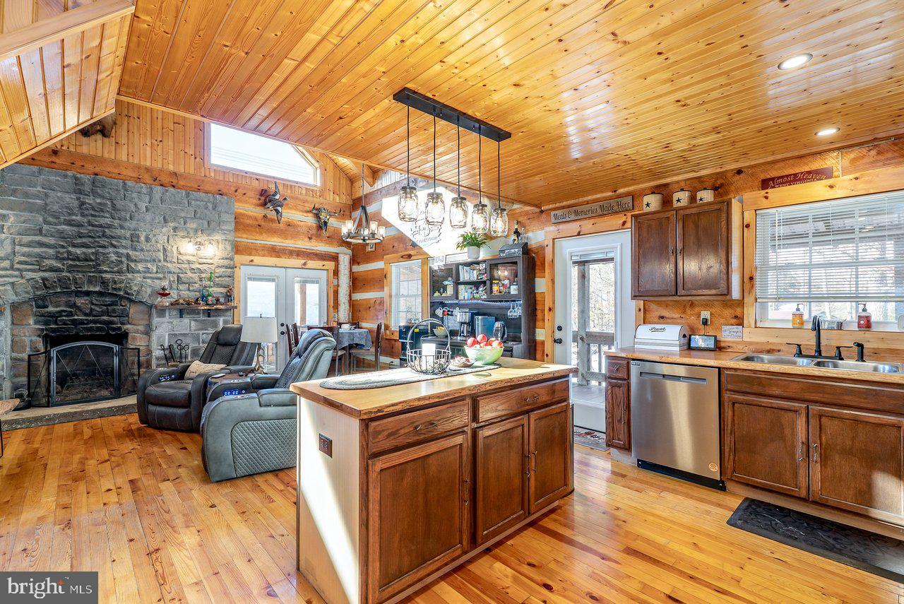147 Bear Rdg Lane Milam, WV 26838 - Photo 7 of 72 a kitchen filled a sink stove and cabinets
