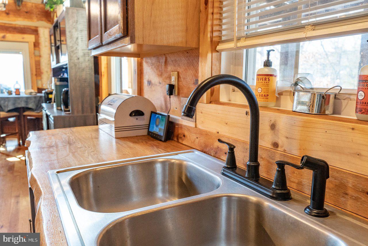 147 Bear Rdg Lane Milam, WV 26838 - Photo 10 of 72 a close view of a sink a faucet and appliance in the balcony