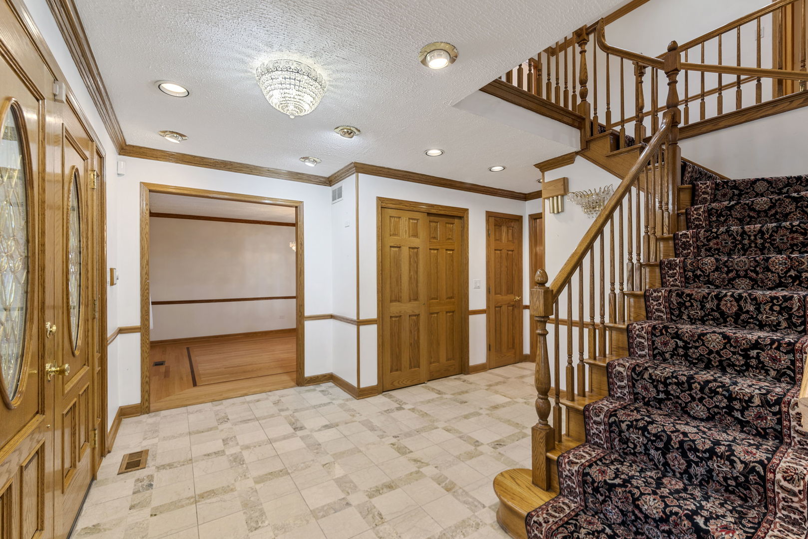 28 Cambridge Drive Oak Brook, IL 60523 - Photo 3 of 28 a view of entryway with stairs