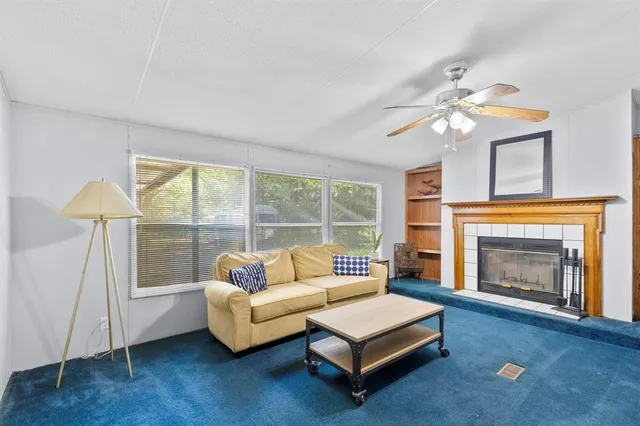 a bedroom with furniture and wooden floor