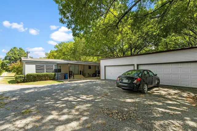 a car parked in front of a house
