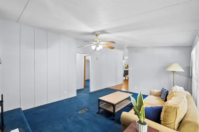 a bathroom with a sink toilet and mirror