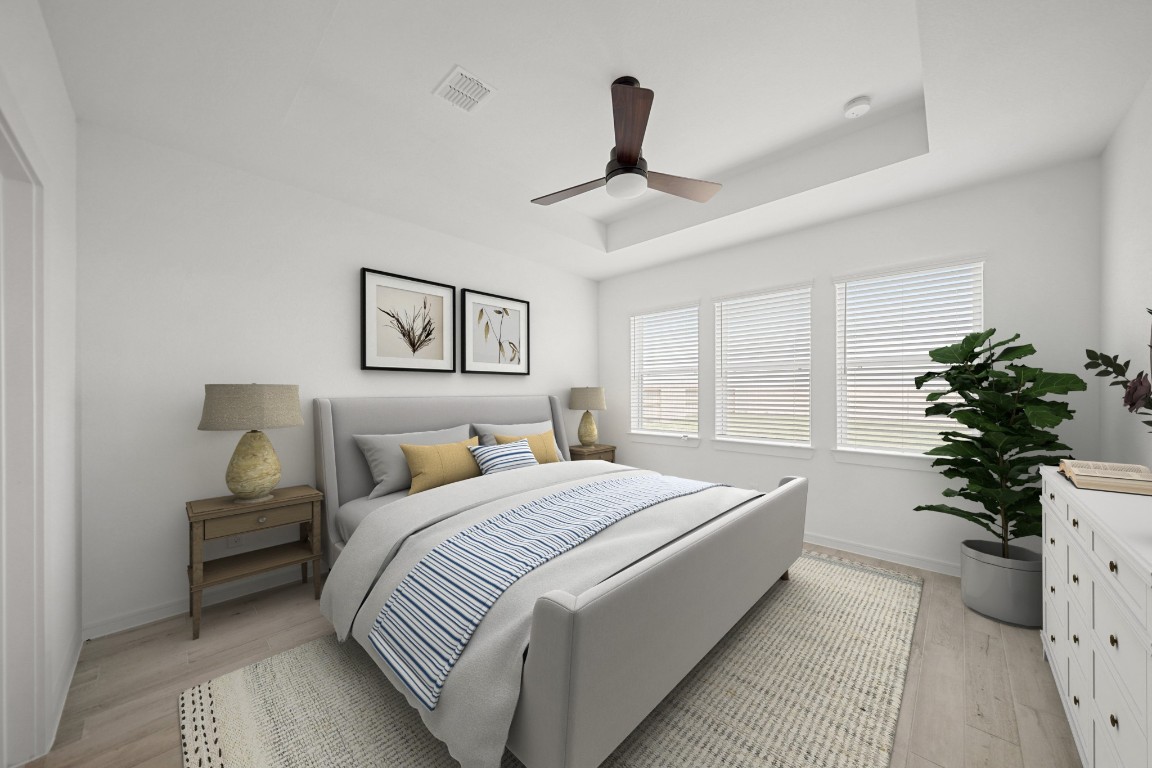 2826 Clapbread Lane Rosenberg, TX 77471 - Photo 11 of 41 a spacious bedroom with a bed and a potted plant