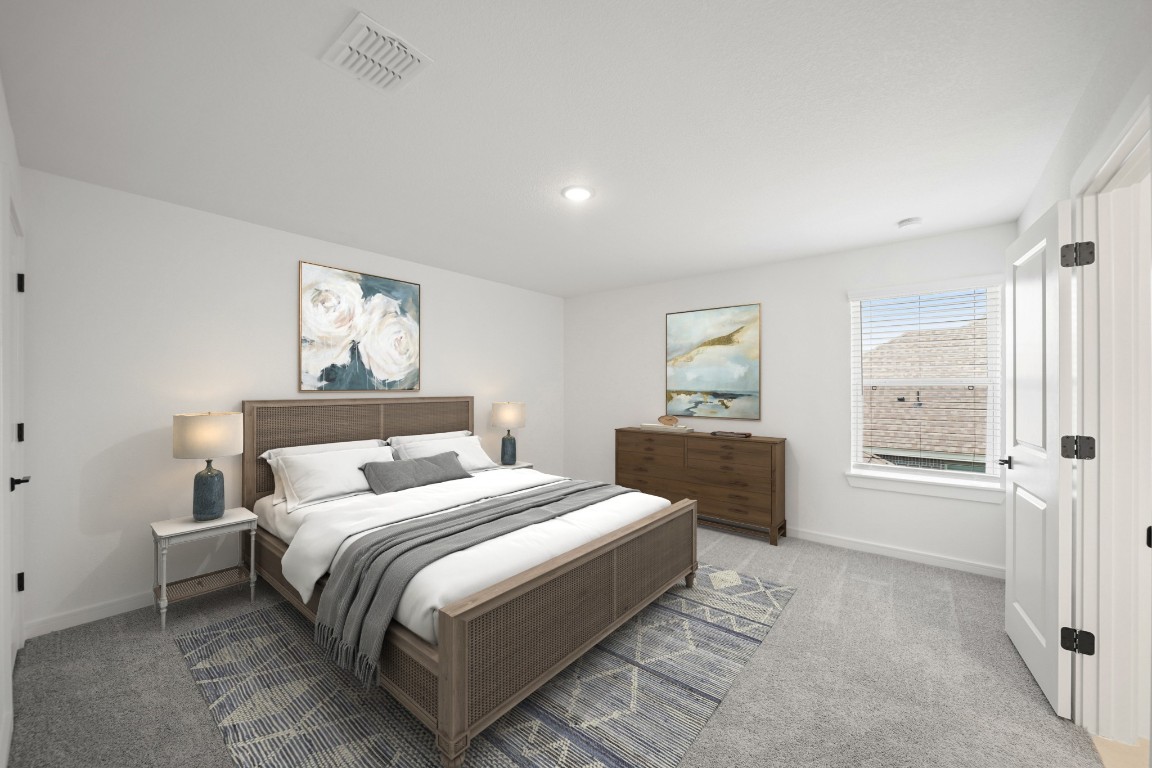 2826 Clapbread Lane Rosenberg, TX 77471 - Photo 17 of 41 a spacious bedroom with a bed and a table in it