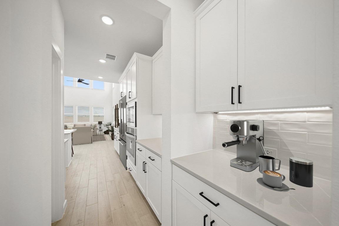 2826 Clapbread Lane Rosenberg, TX 77471 - Photo 7 of 41 a hallway with a view of living room