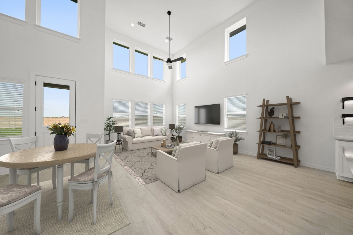 2826 Clapbread Lane Rosenberg, TX 77471 - Photo 8 of 41 a living room with furniture and a wooden floor