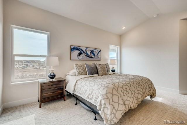 324 Spring Beauty Drive Berthoud, CO 80513 - Photo 15 of 25 a bedroom with a bed and a window