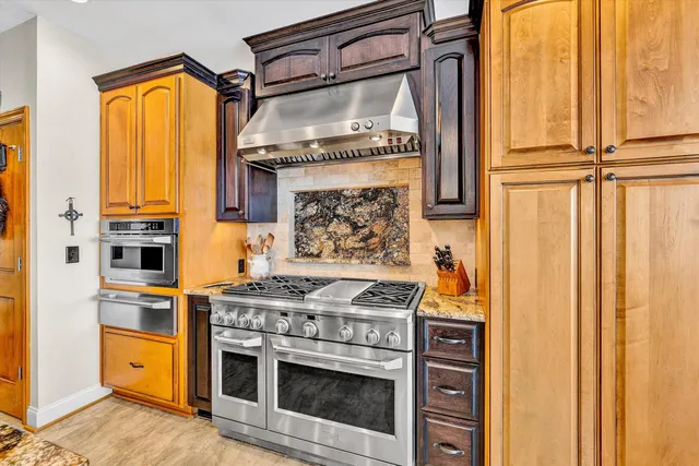 a utility room with a sink a washer and dryer