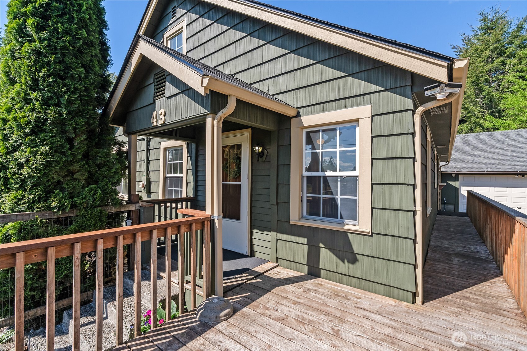 43 Camp Creek Road Montesano, WA 98563 - Photo 1 of 32 a view of a house with a large window and wooden floor
