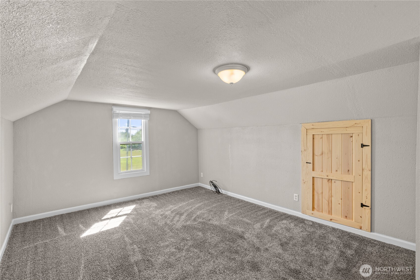43 Camp Creek Road Montesano, WA 98563 - Photo 16 of 32 an empty room with windows and closet