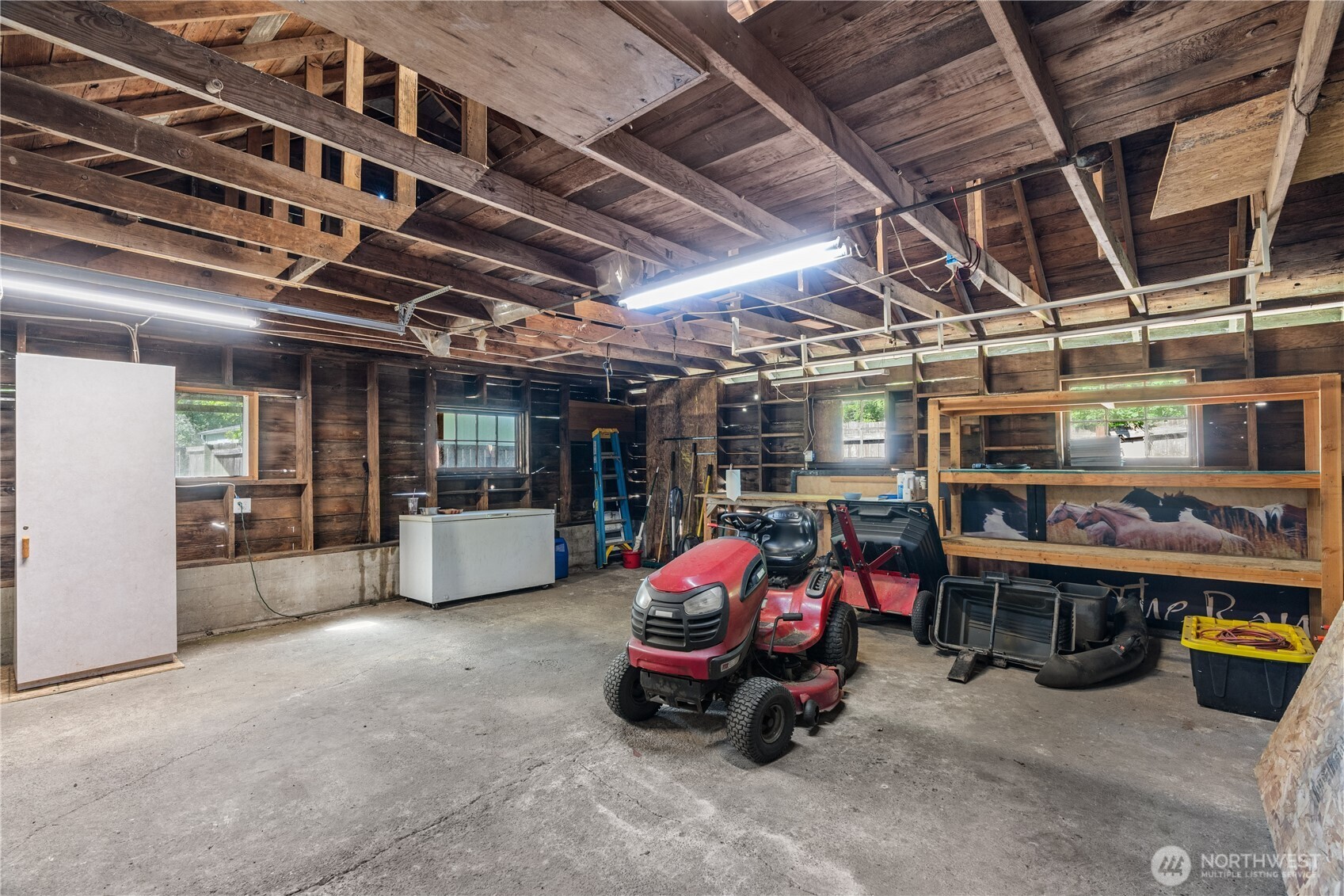 43 Camp Creek Road Montesano, WA 98563 - Photo 17 of 32 a car is parked in a garage